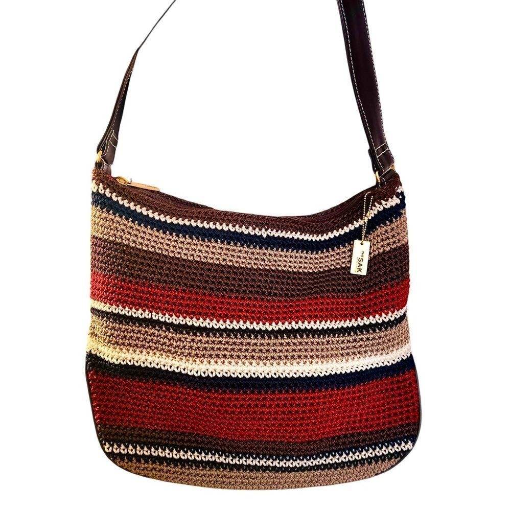 The Sak bag Elliot Luca boho crochet striped in brown, tan, red navy